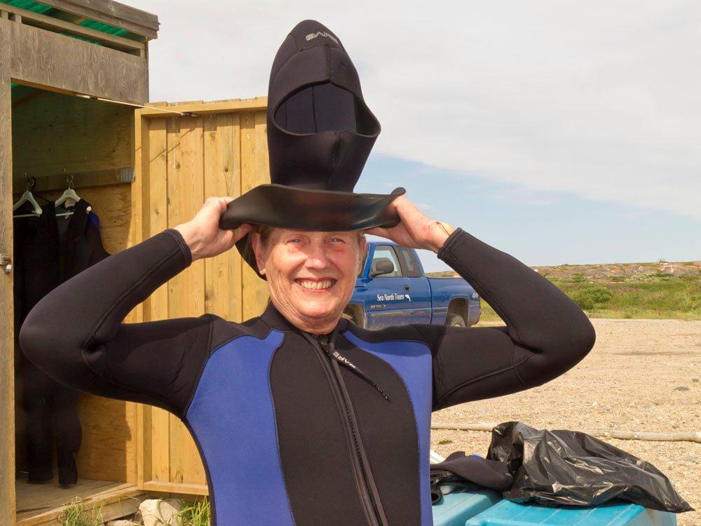 Churchill_Cardozo - Woman Puts On Wetsuit For Beluga Swim